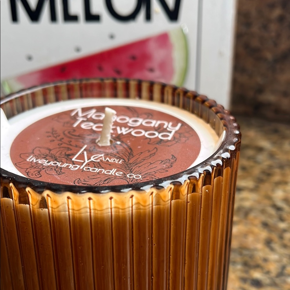 Mahogany Teakwood 10 oz Scented Wick Candle in Iridescent Ribbed Retro Jar